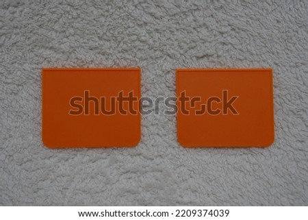 Orange business card set. Blank business cards for company style. On a white textured background.