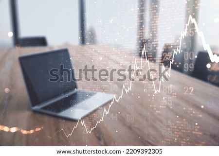 Multi exposure of abstract creative financial chart with world map on laptop background, research and analytics concept