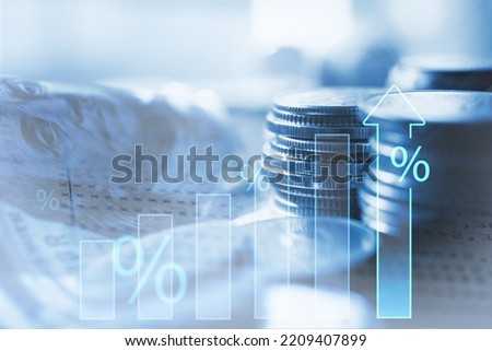 Inflation and tax concept Rising graph of inflation rates.  Americans' Inflation Problem and global economy recession. interest rate hike with USD money, finance and investment background Royalty-Free Stock Photo #2209407899
