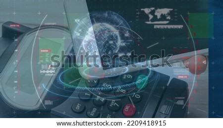 Image of network of connections with media icons and globe over hand. Global business finances technology and connections concept digitally generated image.