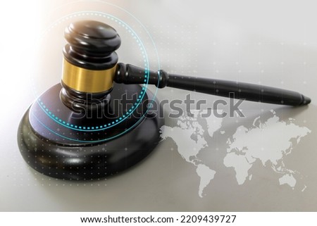The Hammer of Judgment and the Law of Justice,universal law,international litigation Royalty-Free Stock Photo #2209439727