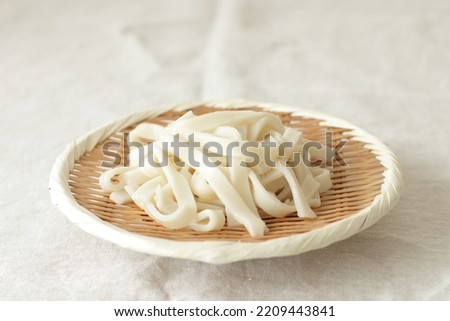Japanese regional food, Kishimen Udon noodles in bamboo basket Royalty-Free Stock Photo #2209443841