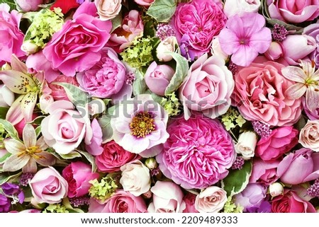 Delicate blooming festive light pink roses and bright flowers, blossoming rose flower background, bouquet floral card, selective focus, shallow DOF