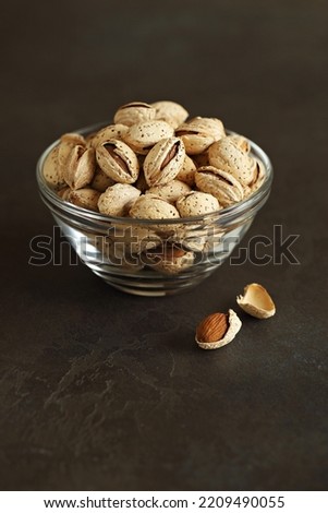 Organic almonds in shell. Selective focus