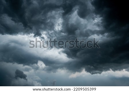  dark storm clouds with background,Dark clouds before a thunder-storm.