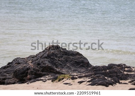 Rocks at the beautiful sandy beach in the southern seas of Thailand