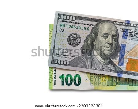 Euro and dollar bills in a common stack. European and US exchange rates - concept.