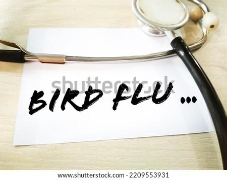 Bird Flu medical term on white background with stethoscope.