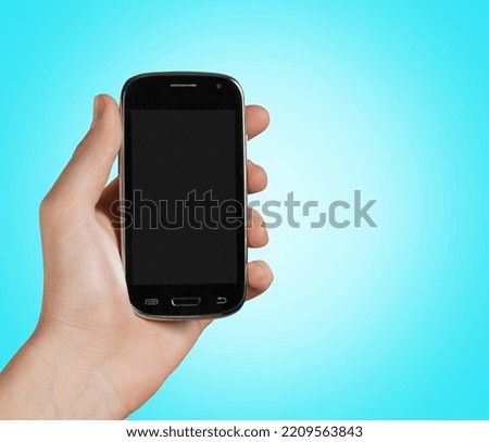 Hand holding modern blank screen smartphone