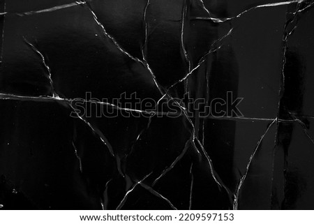 Black damaged cardboard paper overlay texture background