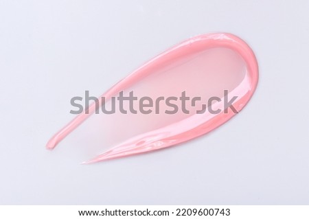 cosmetic smear of balm mask gel on light gray background Royalty-Free Stock Photo #2209600743