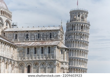 World famous leaning tower in Pisa in Piazza dei Miracoli. Tuscany, Italy Royalty-Free Stock Photo #2209603923