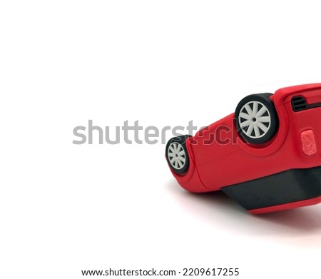 red car toy flips isolated on white background