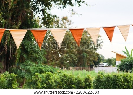 Paper party flags for decoration in camp,no people. Royalty-Free Stock Photo #2209622633