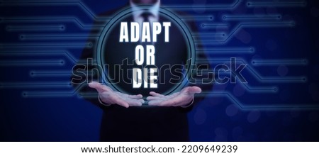 Text showing inspiration Adapt Or Die. Concept meaning Be flexible to changes to continue operating your business Royalty-Free Stock Photo #2209649239