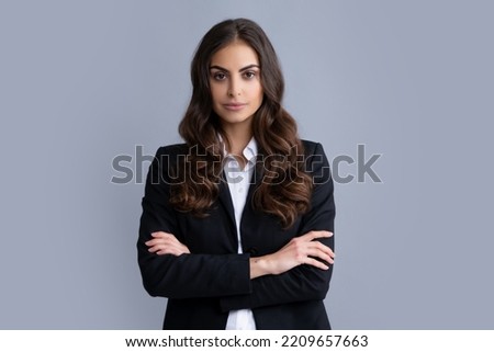 Portrait of successful business woman in suit on gray isolated background. Serious office female worker, manager employees. Royalty-Free Stock Photo #2209657663