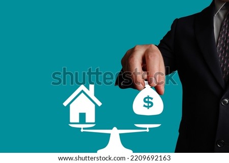Mortgage. Purchase of real estate or property. Weighting bag of money (value) and property.