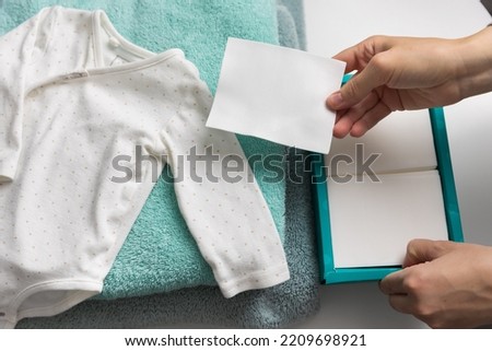 Woman holding a laudry sheet