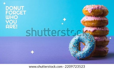 Composition of donut forget who you are text over donuts. Sweets and background maker concept digitally generated image.