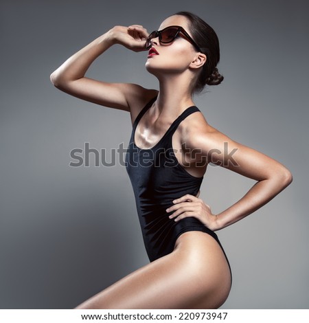 Fashion woman. Bikini and sunglasses.