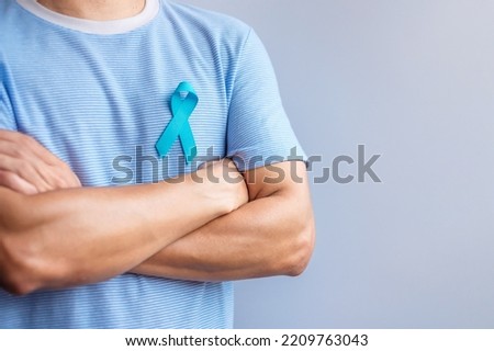 Blue November Prostate Cancer Awareness month, Man in blue shirt with Blue Ribbon for support people life and illness. Healthcare, International men, Father, Diabetes and World cancer day Royalty-Free Stock Photo #2209763043