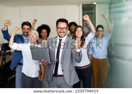 Success group of multiethnic entrepreneurs and business people achieving goals in corporate office Royalty-Free Stock Photo #2209798419