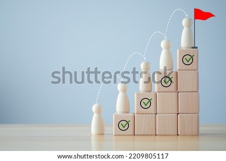 Goals achievement and business success. Human improvement. Personal growth and challenge. Rises up stairs to target. Checklist and Step of arrow with wooden figure human ladder up to 
goal flag. Royalty-Free Stock Photo #2209805117