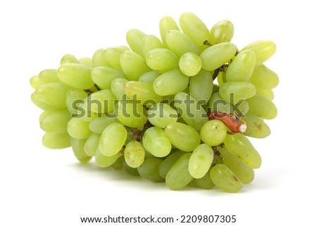 Fresh green grapes with leaves. Isolated on white. stock photo