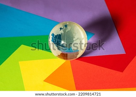 Globe symbol glass rainbow colours