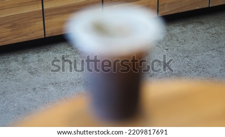 Defocused abstract background of a cup 