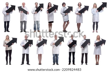 group of successful business people with black arrow