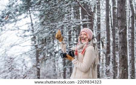 Winter hobby. Woman photographer professional camera. Inspiration create something special. Girl with vintage camera in snowy nature. Traveling concept. Capturing winter. Take stunning winter photos