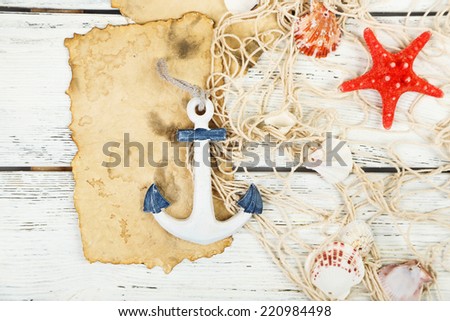 Decor of seashells on wooden table background