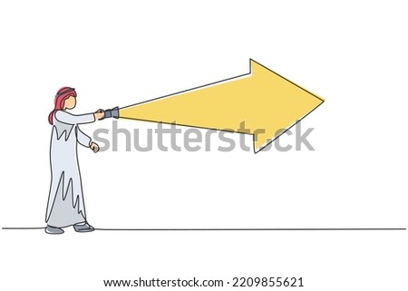 Continuous one line drawing young Arab male manager arrow light the way using flashlight. Success business forward path minimalist concept. Trendy single line draw design vector graphic illustration