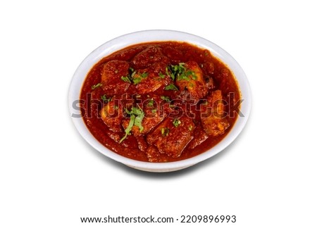 Spicy red mushi, mori or shark curry. Goan style mushi, mori or shark vindaloo. Butter mushi, mori or shark Makhani curry roast hot and spicy gravy dish Dhaba Punjab, India.  Royalty-Free Stock Photo #2209896993