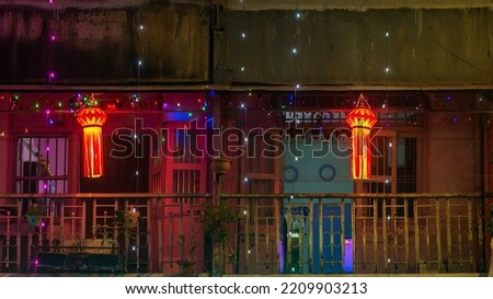 Diwali decorative lamps  or Akash Kandil or Lantern lights hanging outside traditional indian home or chawl in Mumbai Royalty-Free Stock Photo #2209903213