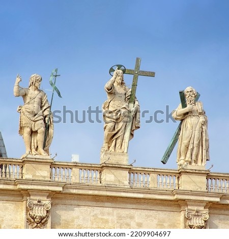 Statues at St. Peter in the Vatican. Christ redeemer in the middle, St. Andrew on the right side and St. John baptist on the left. Royalty-Free Stock Photo #2209904697