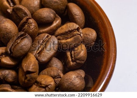 coffee beans isolated in macro,white background