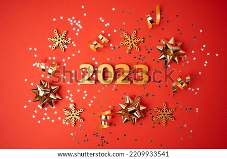 Christmas, winter, new year concept. Merry Christmas and Happy New Year. Christmas, winter, new year concept. Holiday. Happy New Year 2023 poster. Christmas background with big gold 2023 numbers. 