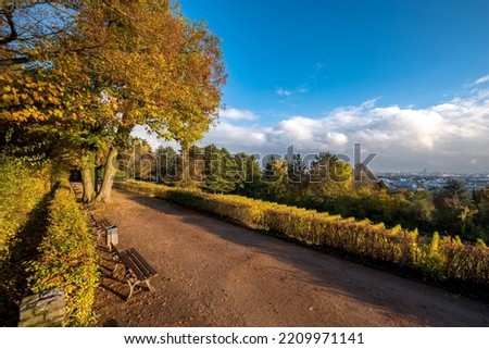 Panoramic view of Lohrberg, a recreation area in Frankfurt am Main with horizon, autumn vineyards and blue sky Royalty-Free Stock Photo #2209971141