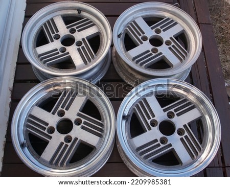 Genuine tire wheels of an old vintage car Royalty-Free Stock Photo #2209985381