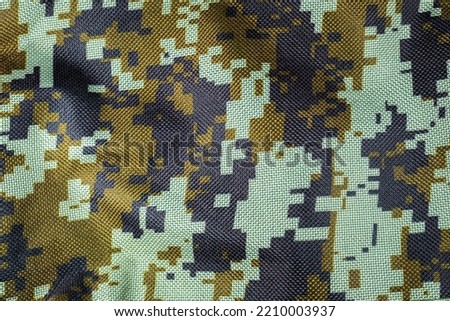 Dark green Camouflage khaki texture with pixels background. Army and military concept.