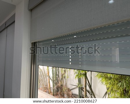 shutters, roller blinds for exterior. European Shutter  Royalty-Free Stock Photo #2210008627