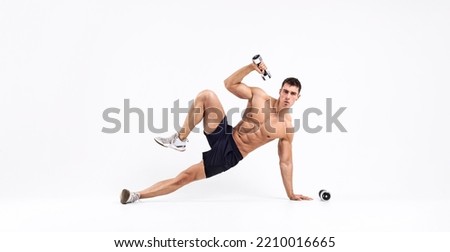 Man athlete with dumbbells isolated on white background. Gym full body workout. Muscular man athlete in fitness gym have havy workout. Sports trainer on trainging. Fitness motivation.