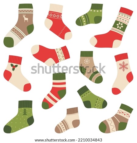 Set of assorted Christmas and winter socks. Vector illustration in flat style