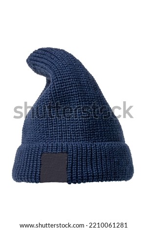 Dark blue fashionable knitted Rapper, Beanie or Baseball hat or cap isolated on white background. Clipping path. Macro. Fishing or Dockworkers hood. Label space.