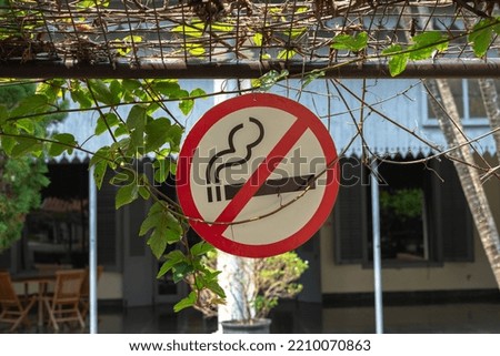 no smoking signs installed in certain places.