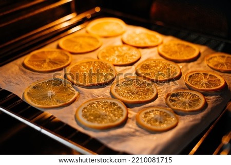 Dried orange in the oven. Orange is dried in the oven Royalty-Free Stock Photo #2210081715