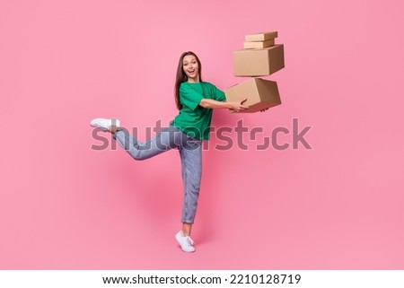 Full length portrait of cheerful crazy person arms hold pile stack packages isolated on pink color background Royalty-Free Stock Photo #2210128719