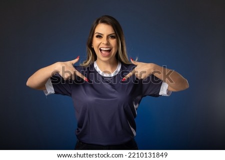 woman soccer fan cheering for her favorite club and team. world cup blue background.